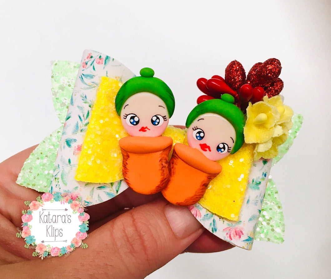 Australian Snugglepot and Cuddlepie Clay bow